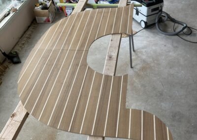 Custom wood floor installation in sailboat - Dirr Woodcraft marine carpentry Orcas Island